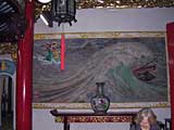 Bas-relief mural depicting Thien Hau on her way to rescue a foundering ship