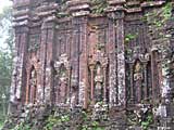 Well preserved carvings on the (mercifully) brighter side of the temple