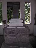 A carved pedestal - altar? coffin?