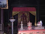 Inside the temple, with the thrones of Emperor Tu Duc and Empress Hoang Le Thien Anh at the back
