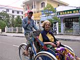 Mary in a cyclo in Hué, Vietnam