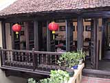 Looking into the upstairs room from the courtyard balcony