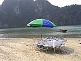 The table laid for lunch on Van Boi island, Ha Long Bay, Vietnam