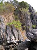 Looking up at the island, showing the jagged limestone rocks