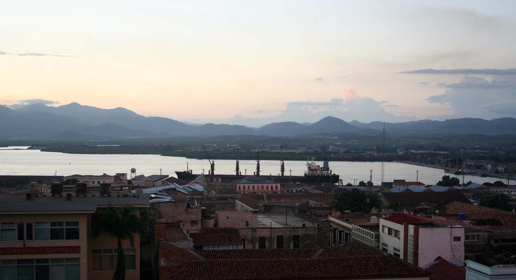 A dusk view towards the bay from the hotel's roof terrace.