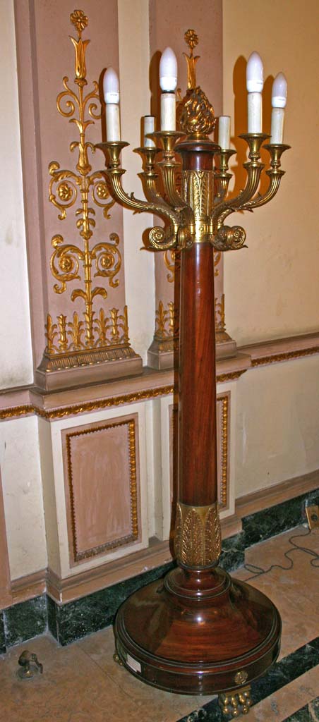 A lamp standard, adapted for electricity.