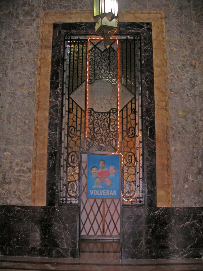 At the back of the lobby, a poster about the five Cubans still imprisoned in the USA.