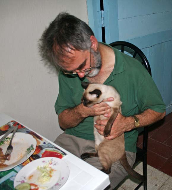 Linda was taking altogether too close an interest in Chris's dinner.