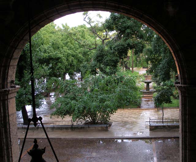 From an upstairs window onto a wet Plaza.