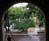 From an upstairs window onto a wet Plaza.